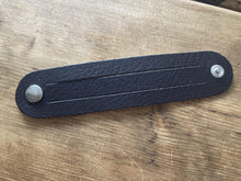 The WoggleMakers Scout Woggle Dark Brown / 5 Scouting Activity Packs - Unplaited Leather Woggles with instructions.