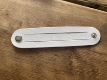 The WoggleMakers Scout Woggle White / 5 Scouting Activity Packs - Unplaited Leather Woggles with instructions.