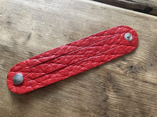 The WoggleMakers Scout Woggle Red / 5 Scouting Activity Packs - Unplaited Leather Woggles with instructions.
