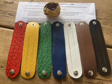 The WoggleMakers Scout Woggle Yellow / 5 Scouting Activity Packs - Unplaited Leather Woggles with instructions.